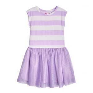 Girl’s purple and white dress